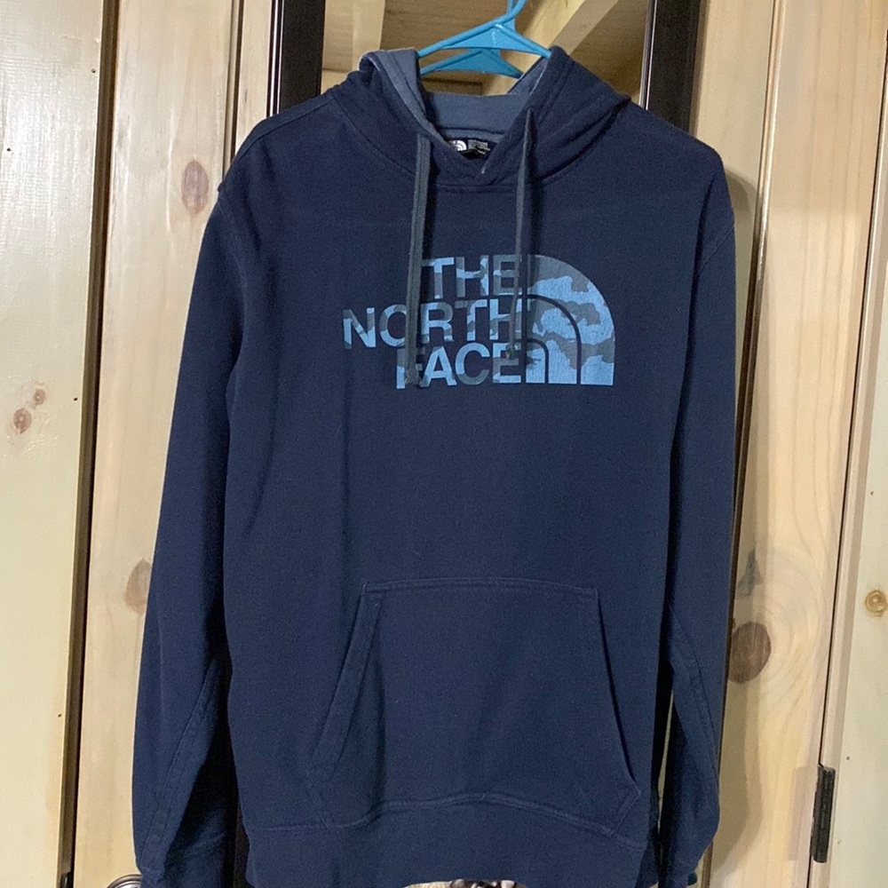 The north face size medium, headed with front pocket